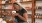 a woman holding a cup