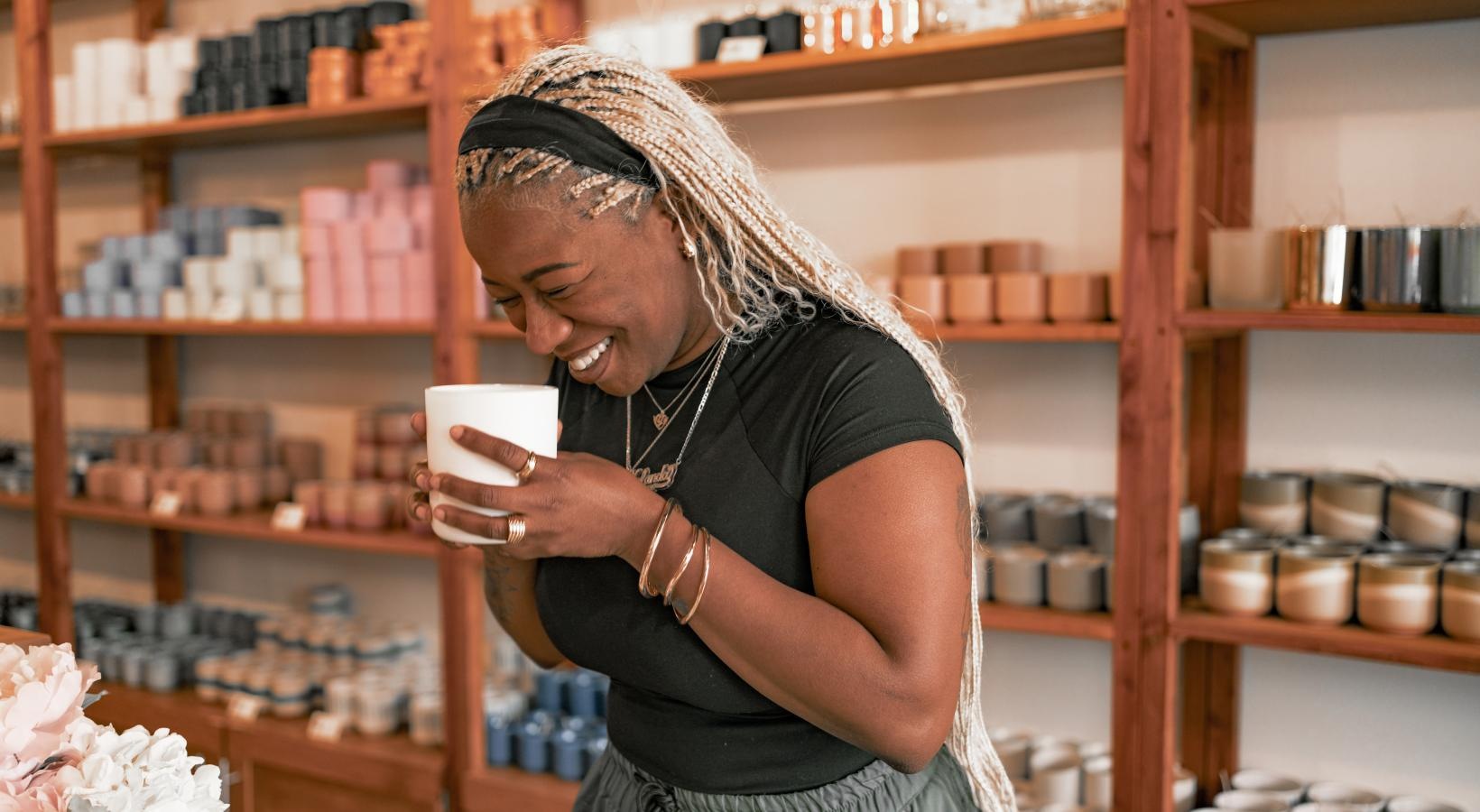 The essence of exceptional living a woman holding a cup