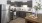 a kitchen with black cabinets
