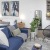 a living room with a blue couch