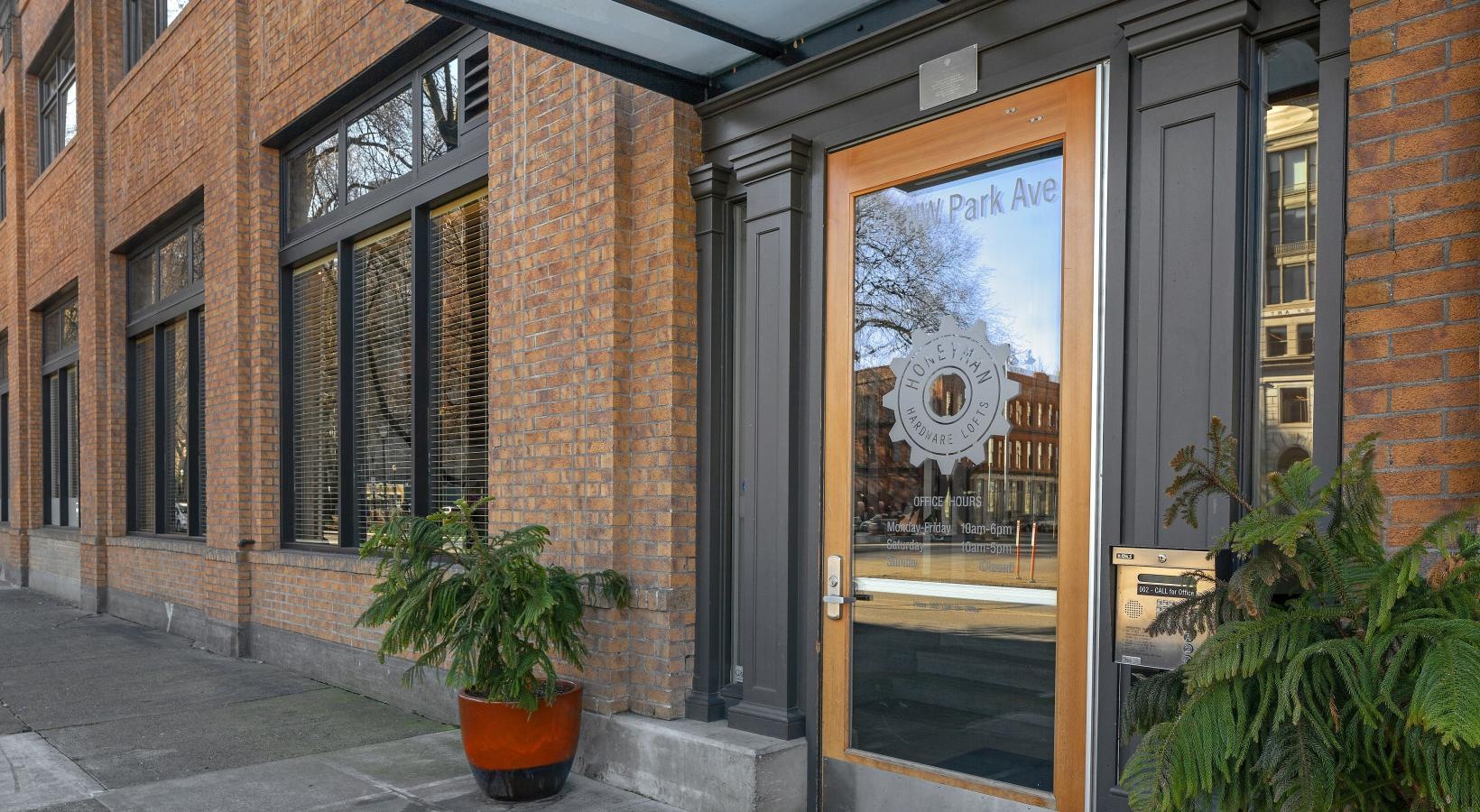 The essence of exceptional living a brick building with a glass door